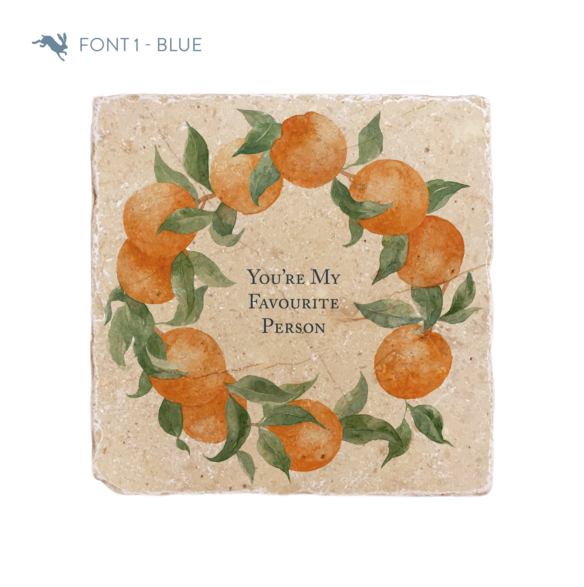 A medium marble platter featuring a wreath of oranges and leaves, personalised with the bespoke message ‘You’re My Favourite Person’ in the centre of the platter in a blue font.