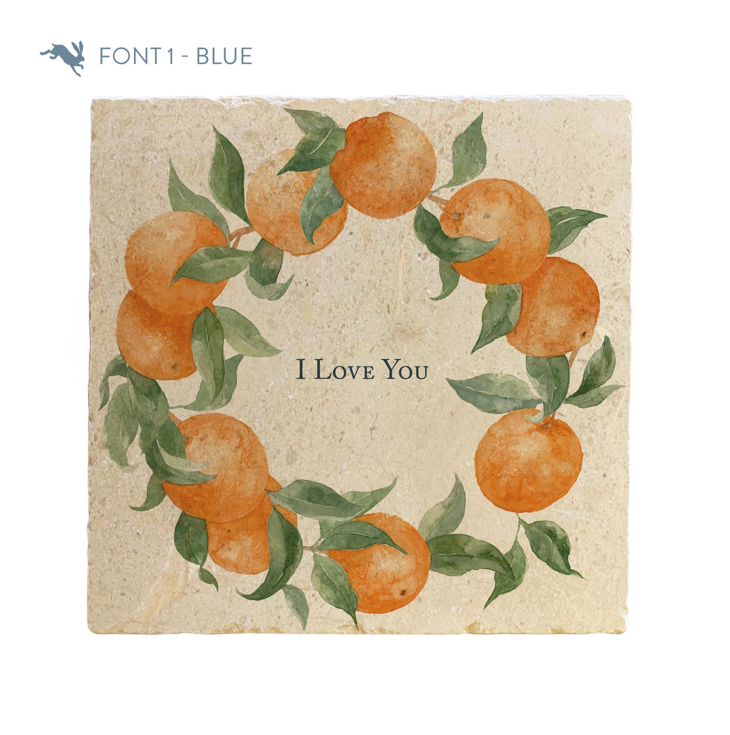 A large marble platter featuring a wreath of oranges and leaves, personalised with the bespoke message ‘I Love You’ in the centre of the platter in a blue font.