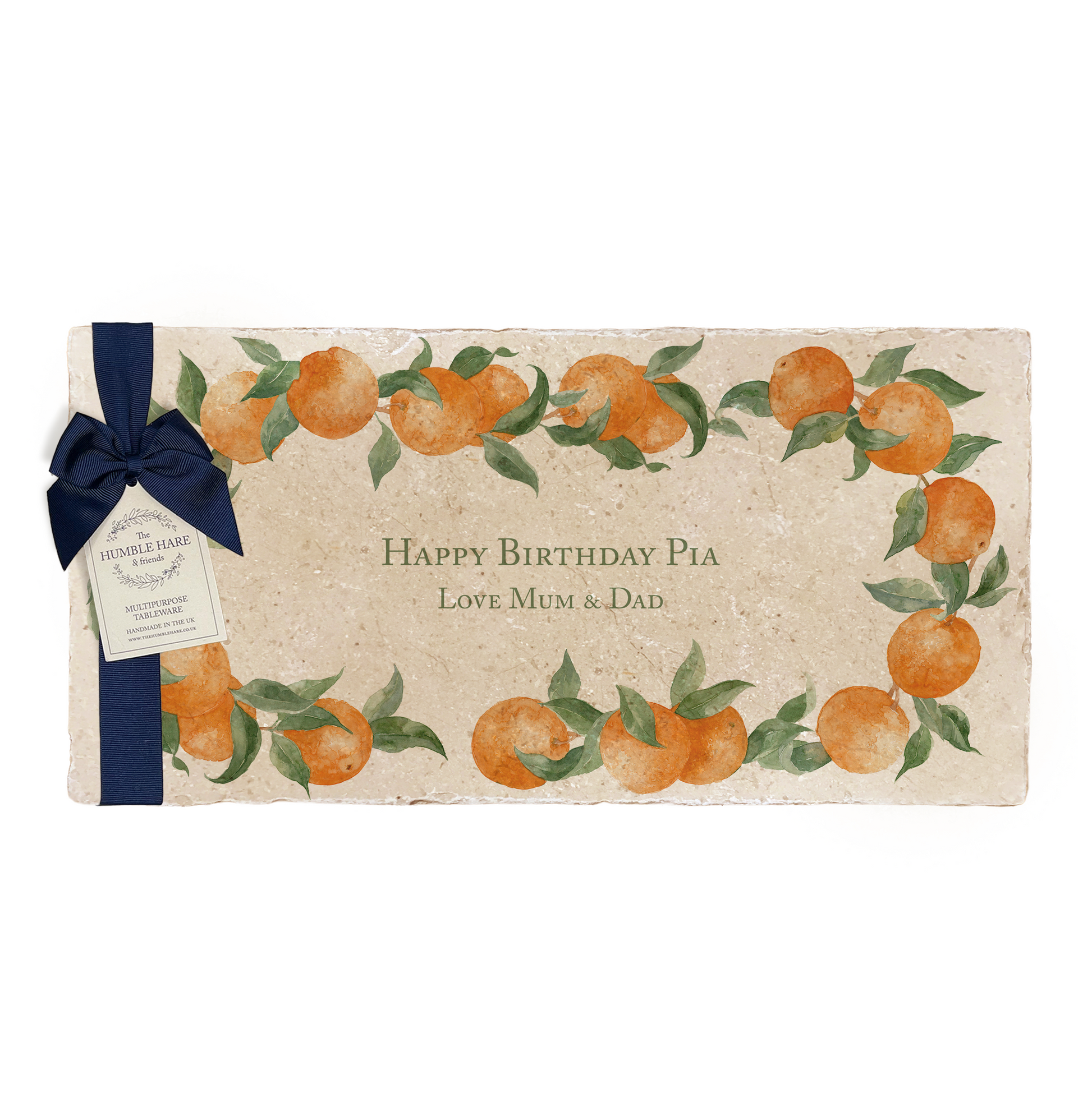 A personalised marble sharing platter featuring a wreath of oranges and leaves, with a bespoke message in the centre of the design. The platter is packaged with a luxurious blue gift bow and tag.