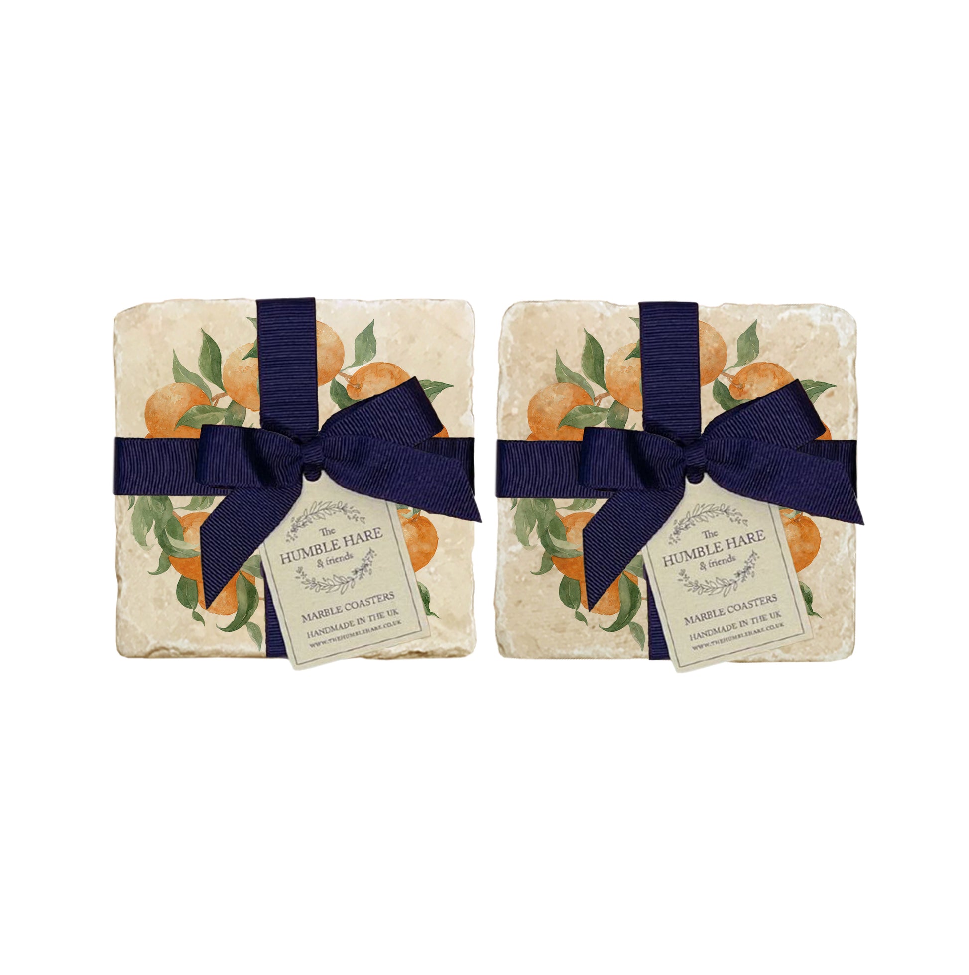 A set of 4 handmade marble coasters featuring a watercolour orange wreath design, packaged in 2 pairs, with a luxurious blue bow and gift tag.