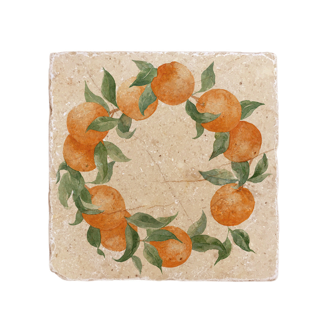 A medium square multipurpose marble platter, featuring a watercolour wreath design made up of vibrant oranges and dark green leaves.