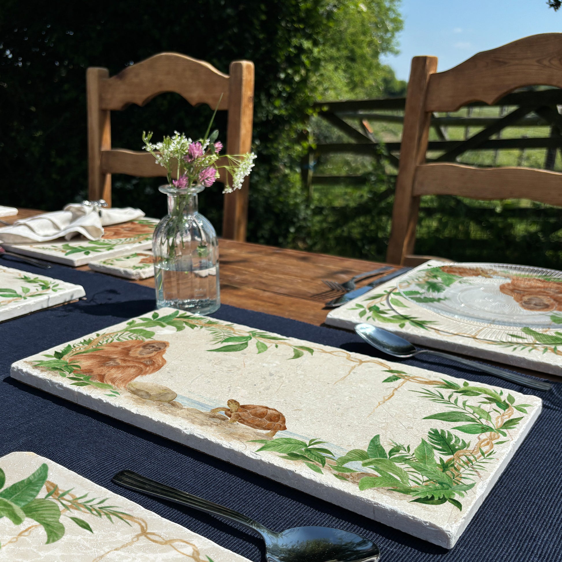 Welcoming our Rainforest Design, surrounded by the rainforest leaves and vines. Our Orangutan and Tortoise sitting a quiet corner of the rainforest. Illustrated in our  original watercolour designs on Sharing Serving Platter. 