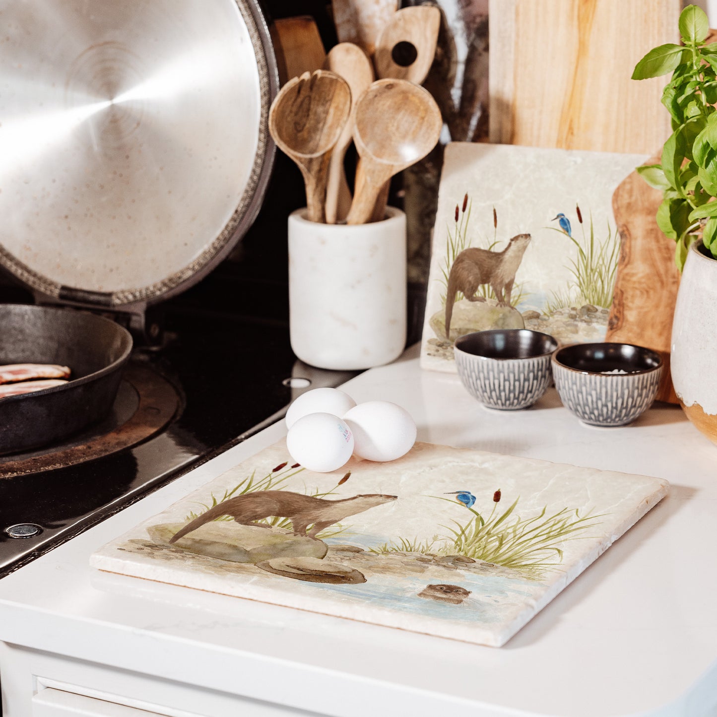 Otter and Kingfisher down by the Riverbank watercolour design on our natural marble stone platter. Perfect worktop saver. Finished with a beautiful blue bow
