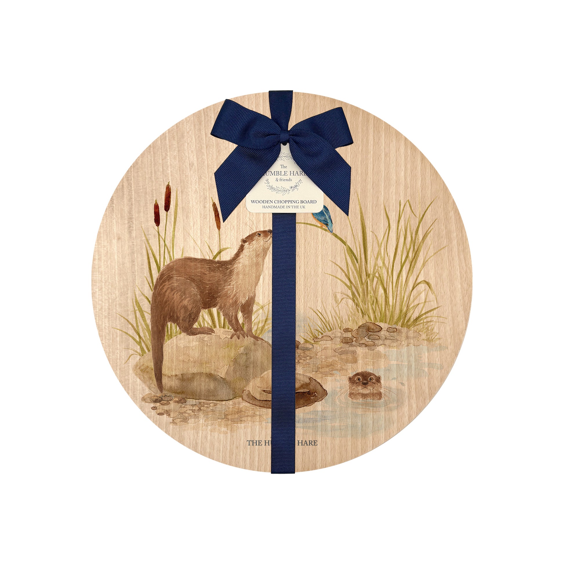 Round beech wood chopping board featuring a watercolour design of otters and a kingfisher down by the river bank. The wooden board is finished with a blue gift ribbon and tag.
