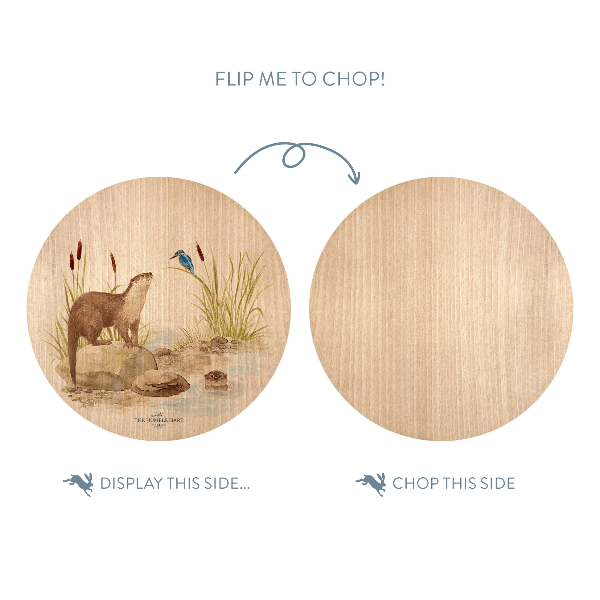 Wooden cutting board with an otter and kingfisher illustration on one side and plain wood on the other, with text indicating which side to display and which to chop.
