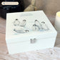White Wooden Christmas Eve box, perfect for Christmas sweets and treats. A great Keepsake box with penguins and Santa's hats ready to enjoy the Christmas festivities. 