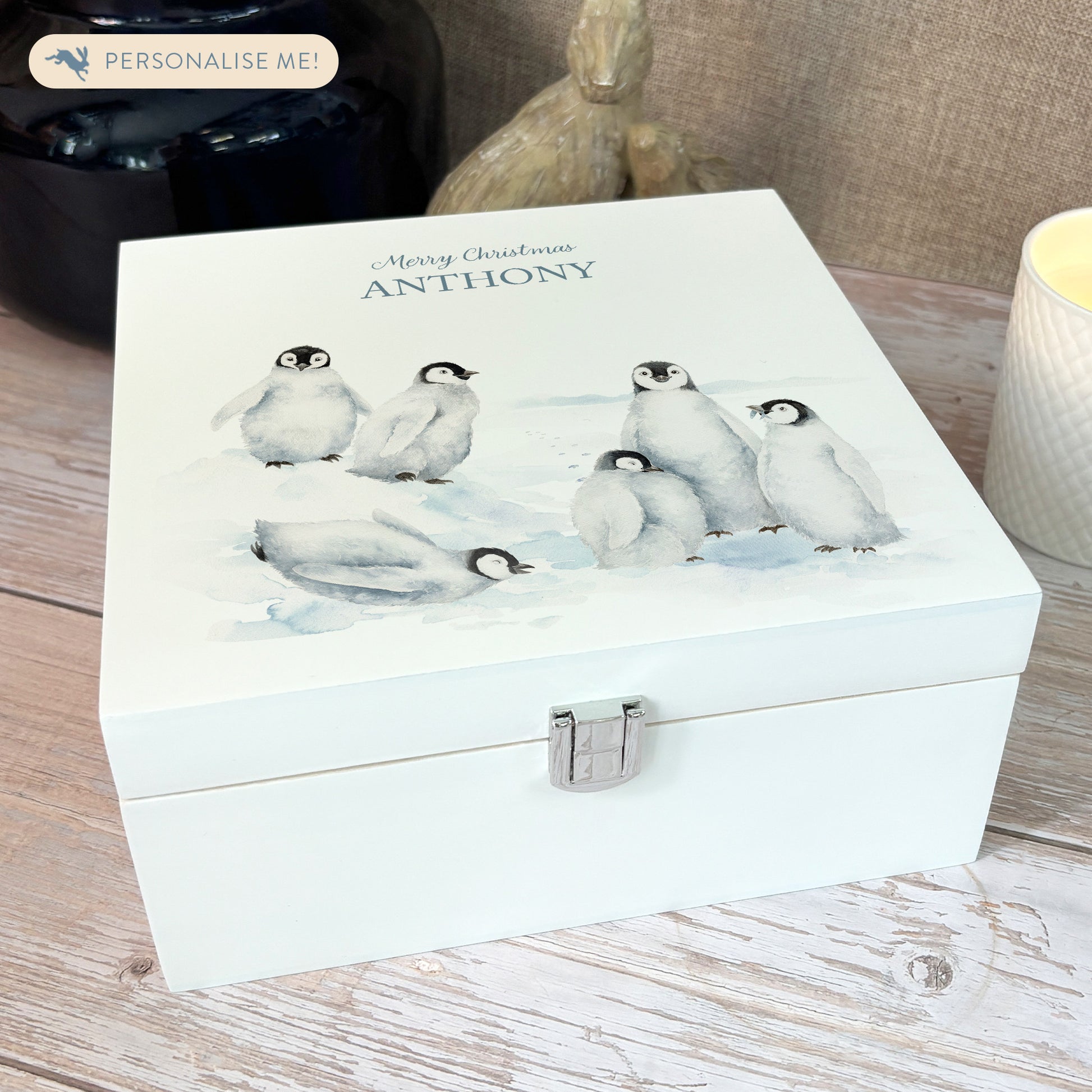 White Wooden Christmas Eve box, perfect for Christmas sweets and treats. A great Keepsake box with penguins and Santa's hats ready to enjoy the Christmas festivities. 