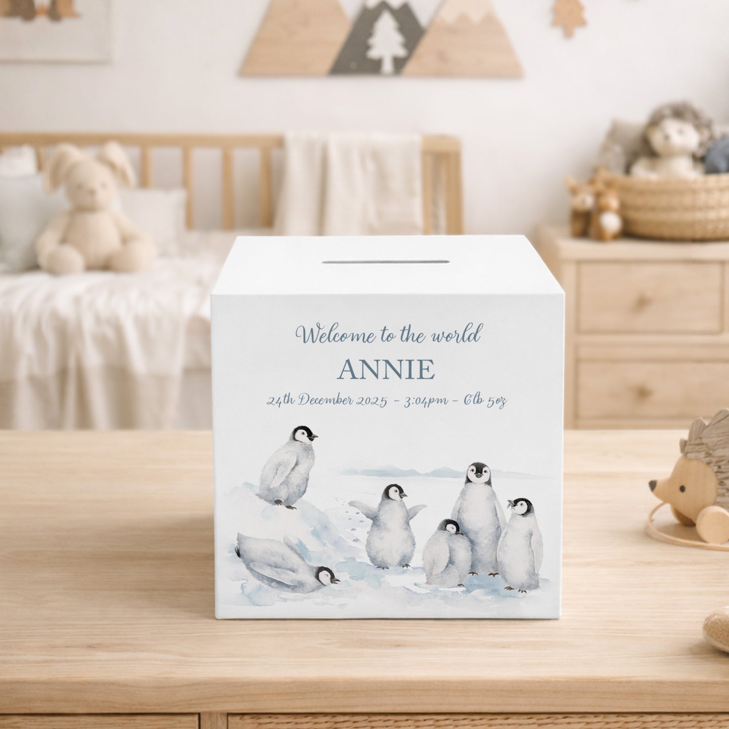 personalised handmade baby money box for new baby nursery or bedroom- Penguins having fun sliding in the snow