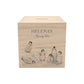 handmade nursery keepsake money box with delicate watercolour design, a group of Penguins playing, slipping and sliding in the snow. 