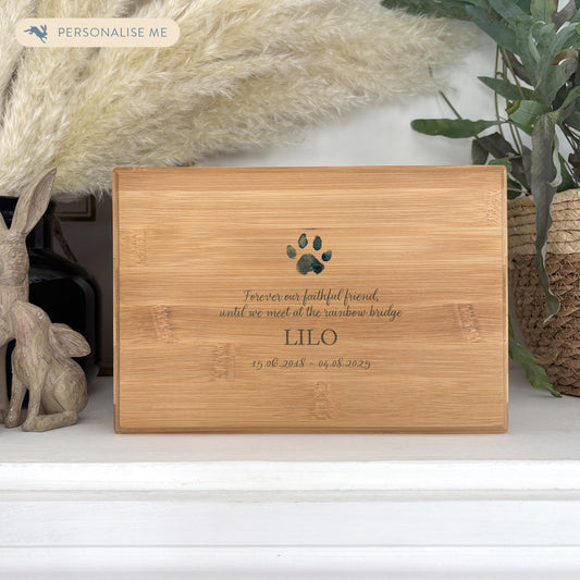 A beautifully crafted solid Bamboo wooden urn, personalised and finished with a soft watercolour design to commemorate your beloved pet that has passed away. Decorative urn that can be personalised to keep your pets ashes in. 