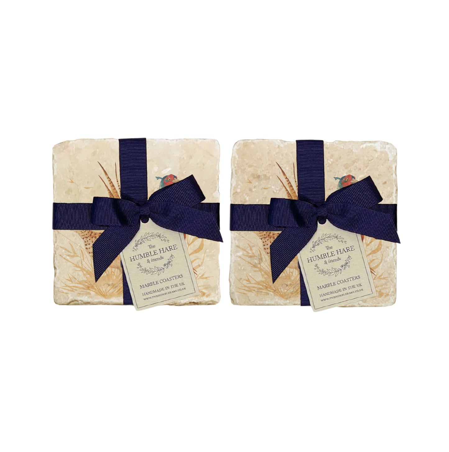 A set of 4 handmade marble coasters featuring a watercolour pheasant design, packaged in 2 pairs, with a luxurious blue bow and gift tag.