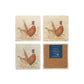 A set of 4 square marble coasters, featuring a watercolour design of a pair of pheasants. One coaster is flipped to show that the coasters are backed with cork.