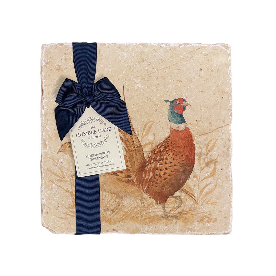 A medium multipurpose marble platter with a pheasant design, packaged with a luxurious dark blue bow and branded gift tag.