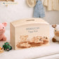 handmade wooden money box with watercolour design in nursery setting