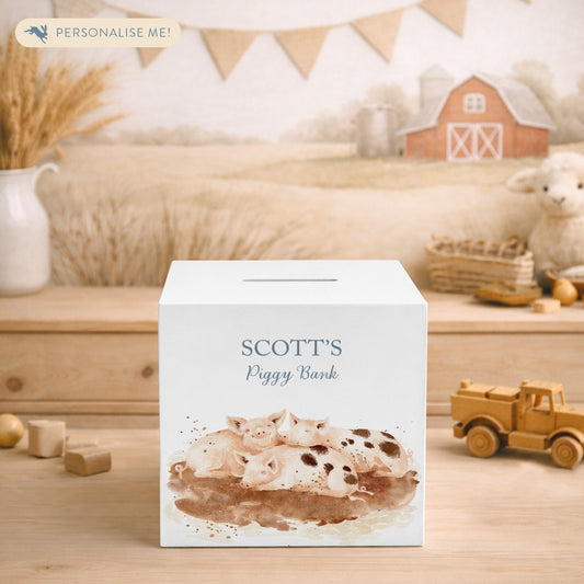 handmade personalised wooden money box with watercolour design in nursery. Piglets playing in muddy puddles 
