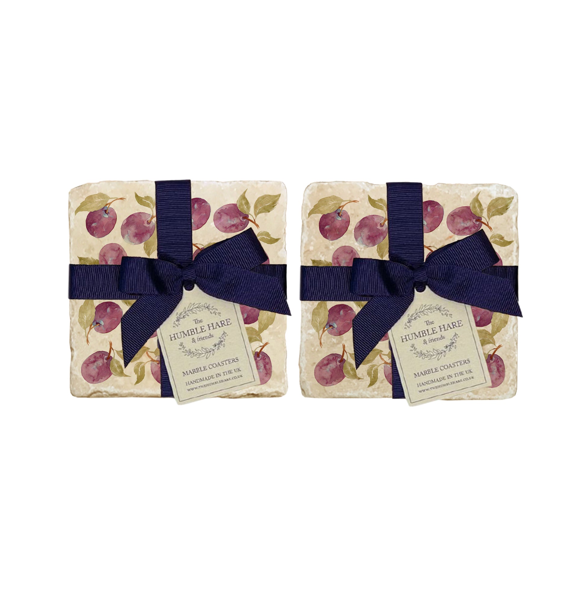 A set of 4 handmade marble coasters featuring a watercolour plum pattern, packaged in 2 pairs, with a luxurious blue bow and gift tag.