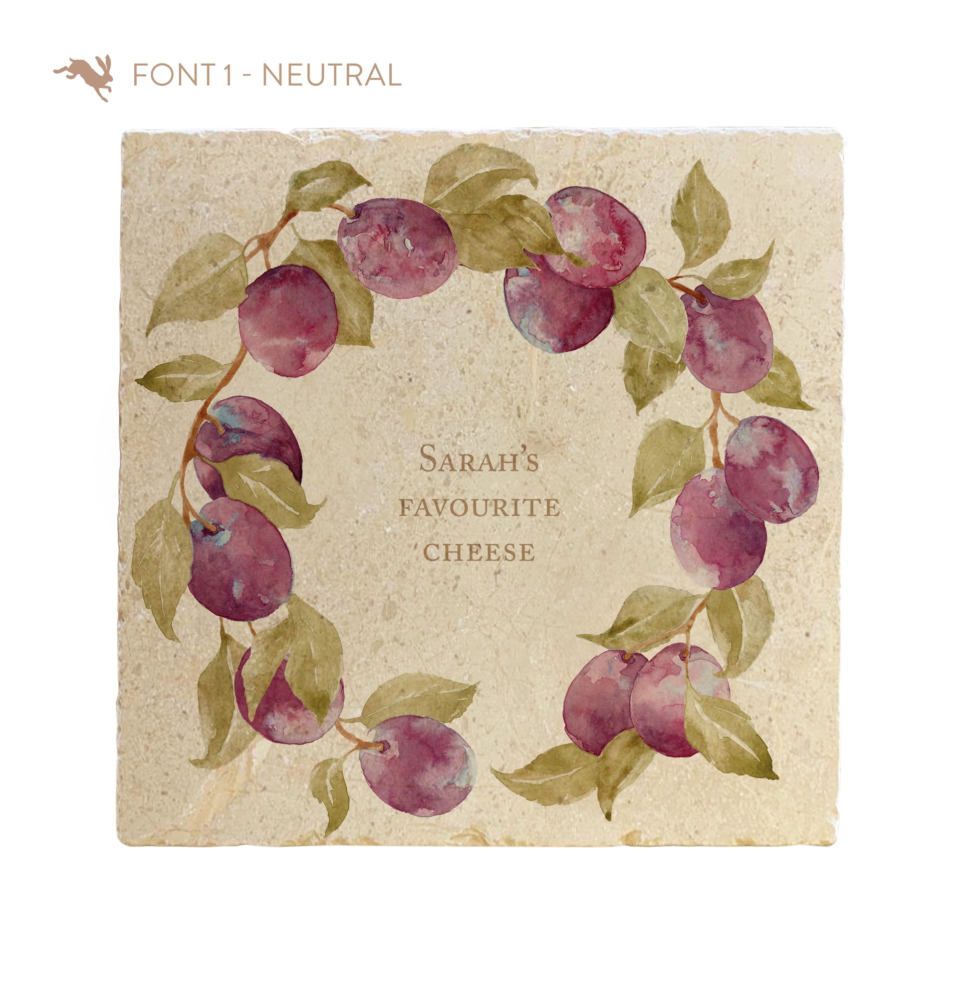 A large marble platter featuring a wreath of plums and leaves, personalised with a custom phrase in the centre of the platter in a neutral font.