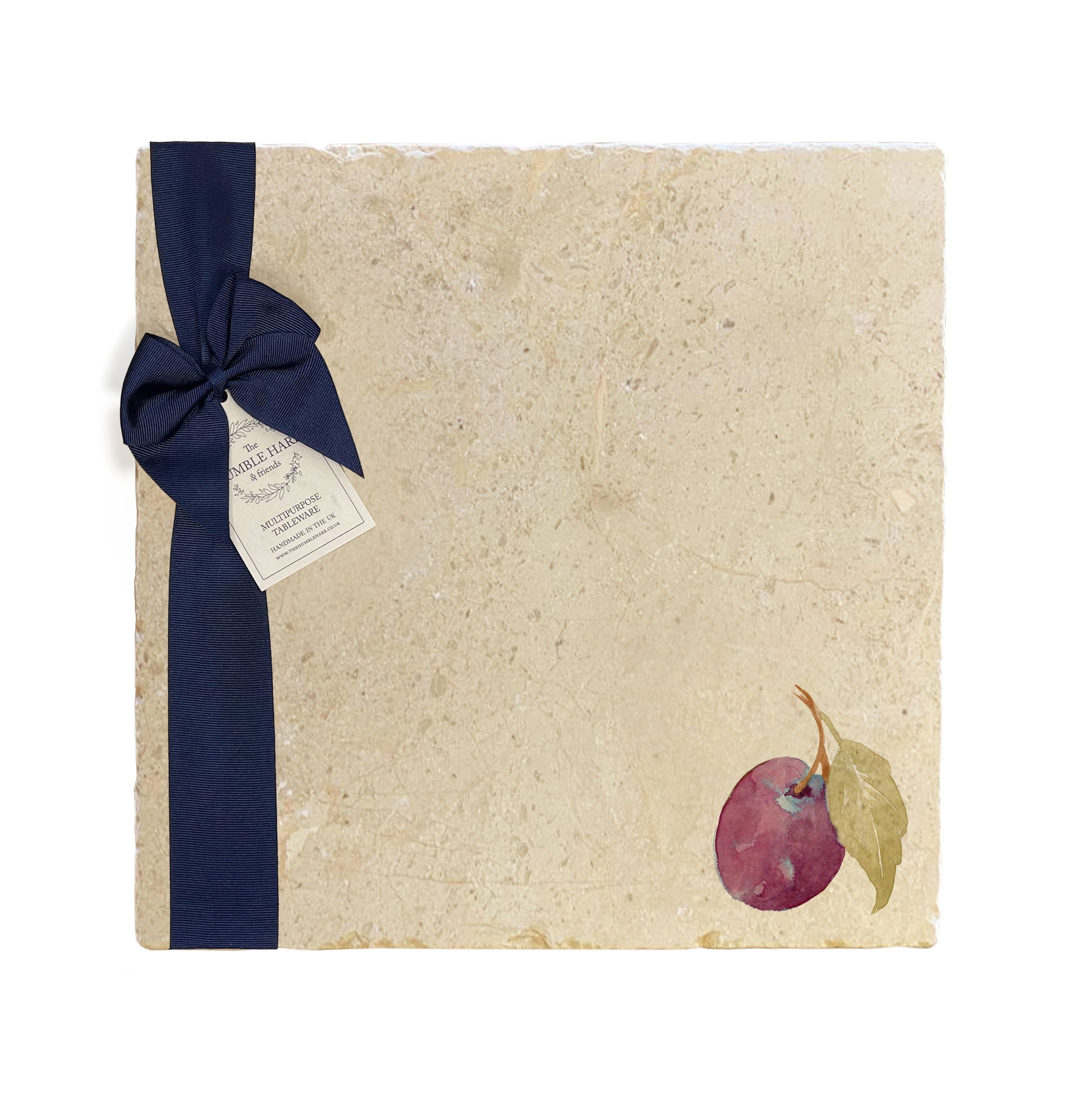 A large multipurpose marble platter with a watercolour plum design, packaged with a luxurious dark blue bow and branded gift tag.