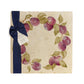 A large multipurpose marble platter with a watercolour plum wreath design, packaged with a luxurious dark blue bow and branded gift tag.