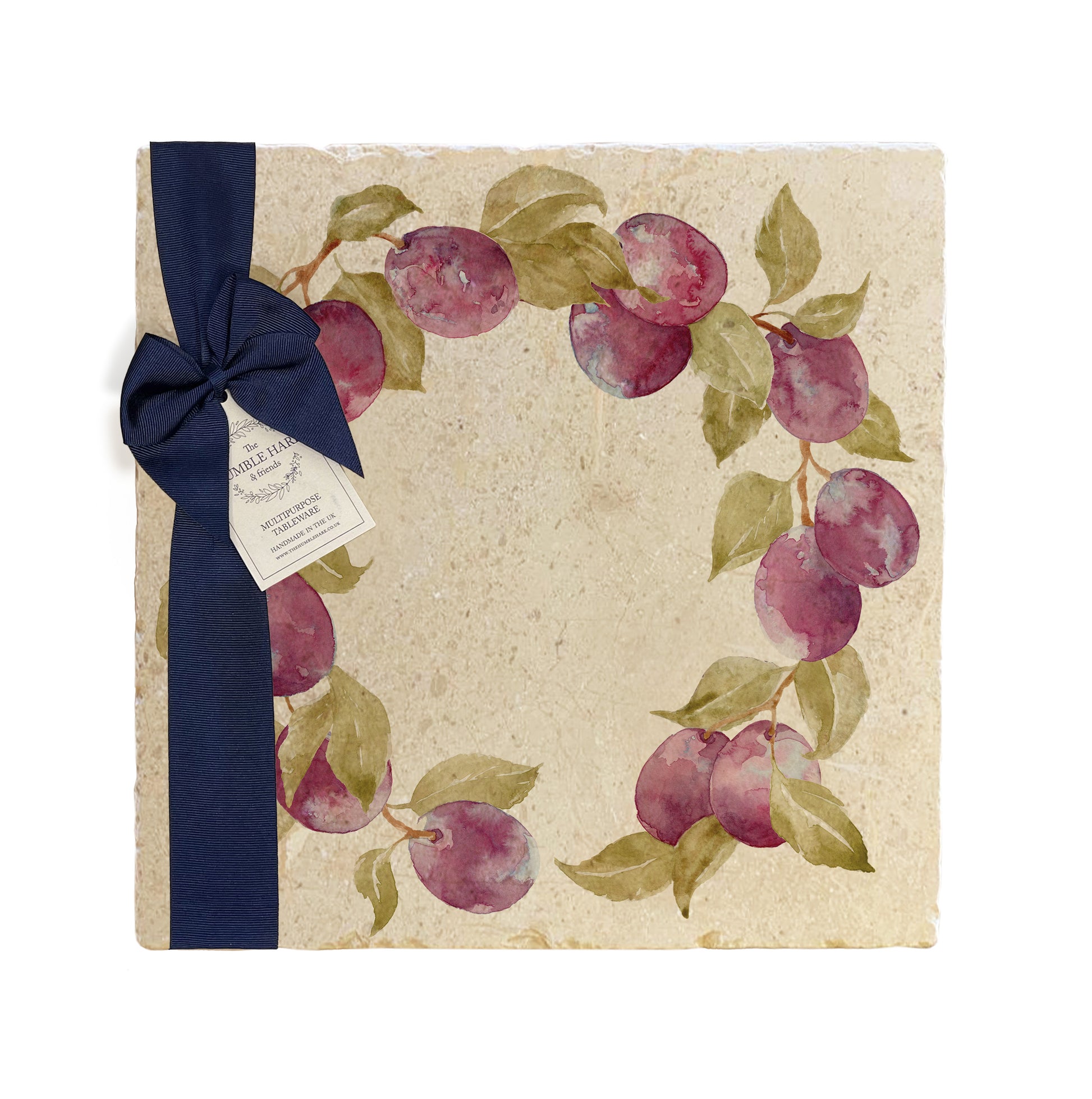 A large multipurpose marble platter with a watercolour plum wreath design, packaged with a luxurious dark blue bow and branded gift tag.