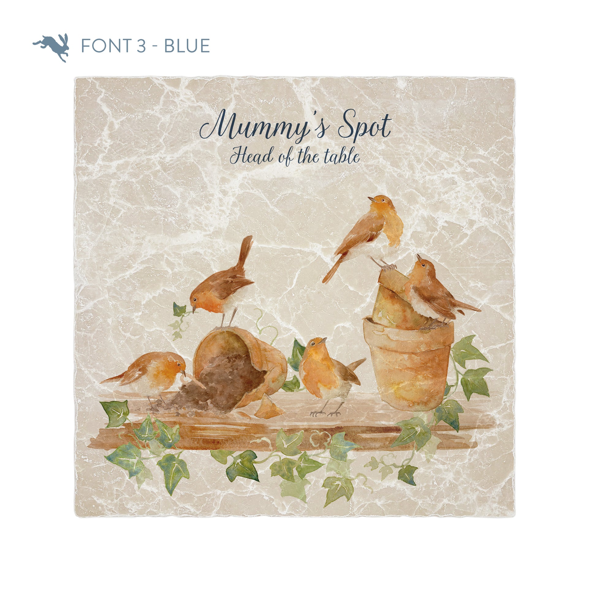 A large square personalised marble placemat with a robin design. The placemat is personalised with a 'Mummy's Spot, Head of the Table' at the top in a dark blue brush script font.