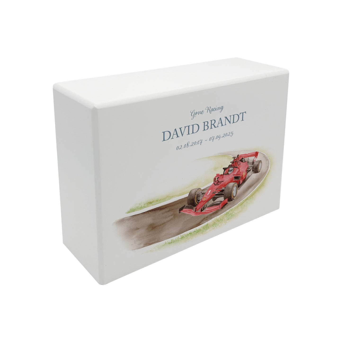 A beautifully crafted solid wooden urn, finished in white with a soft watercolour design of a Race F1 Race car  on a track, perfect for Dad, Thoughtfully made for either display or burial, this personalised urn can be customised to create a meaningful memorial. Perfect for holding ashes of a loved one or a beloved pet, it serves as a comforting tribute and keepsake.