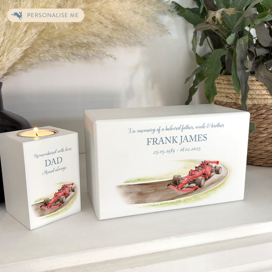 A beautifully crafted solid wooden urn, finished in white with a soft watercolour design for The Race car addict someone who was a petrol head and loved his cars, Thoughtfully made for either display or burial, this personalised urn can be customised to create a meaningful memorial. Perfect for holding ashes of a loved one or a beloved pet, it serves as a comforting tribute and keepsake.