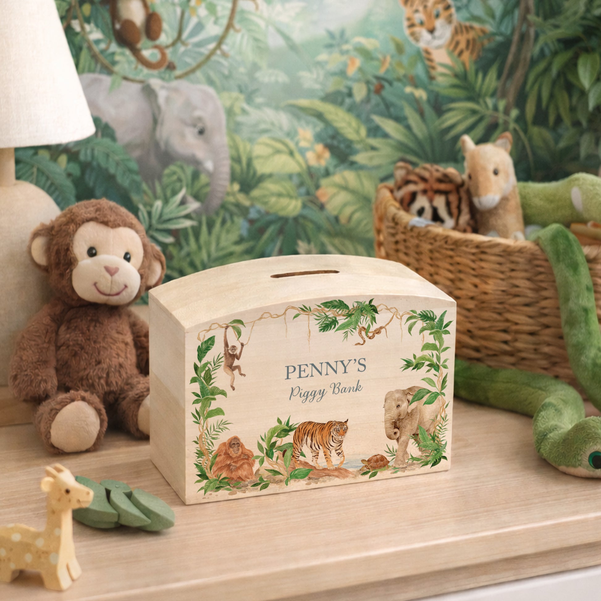 personalised handmade baby money box with watercolour animals in childrens bedroom jungle themed