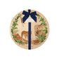 Round beech wood chopping board featuring a watercolour design of rainforest animals in the jungle. The wooden board is finished with a blue gift ribbon and tag.