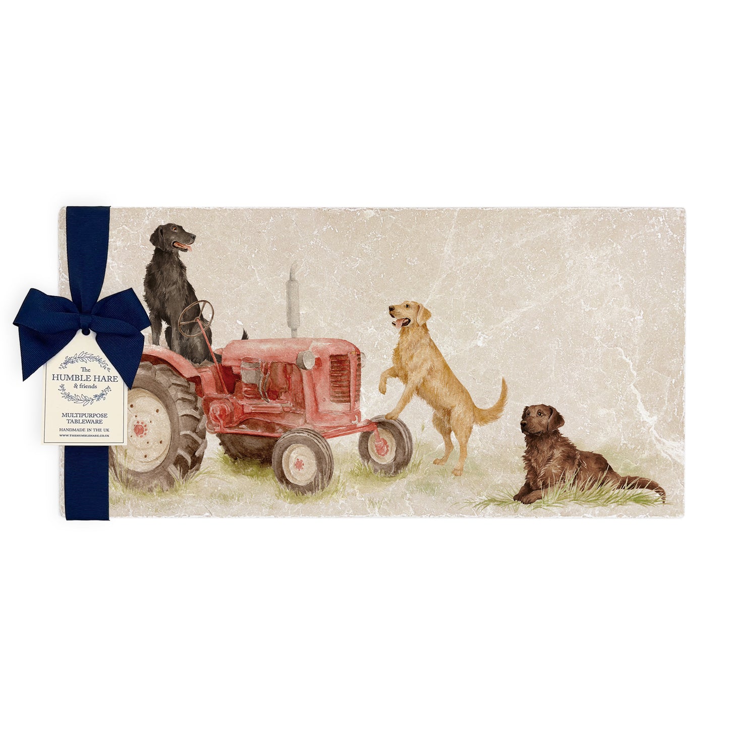 A rectangular marble sharing platter featuring a watercolour design of working retriever dogs sat on a vintage red tractor. The platter is packaged with a luxurious blue gift bow.
