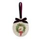 An oval marble Christmas ornament featuring a robin sitting on a green wreath, with personalised text written below. The ornament has a burgundy red velvet ribbon and bow hanging loop.