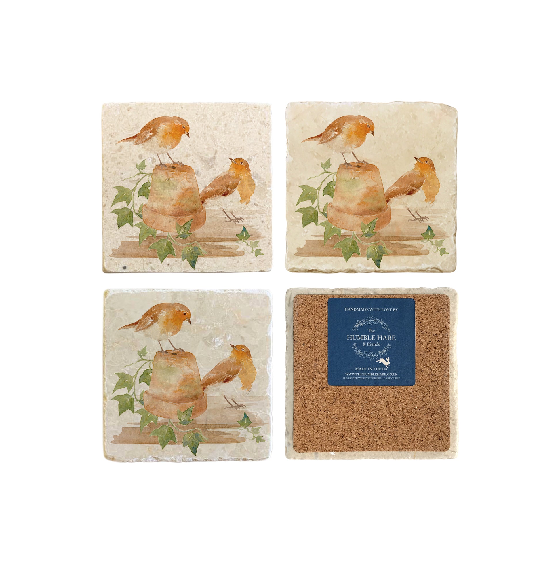 A set of 4 handmade marble coasters, featuring a watercolour robin design. One coaster is flipped to show that the coasters are backed with cork.