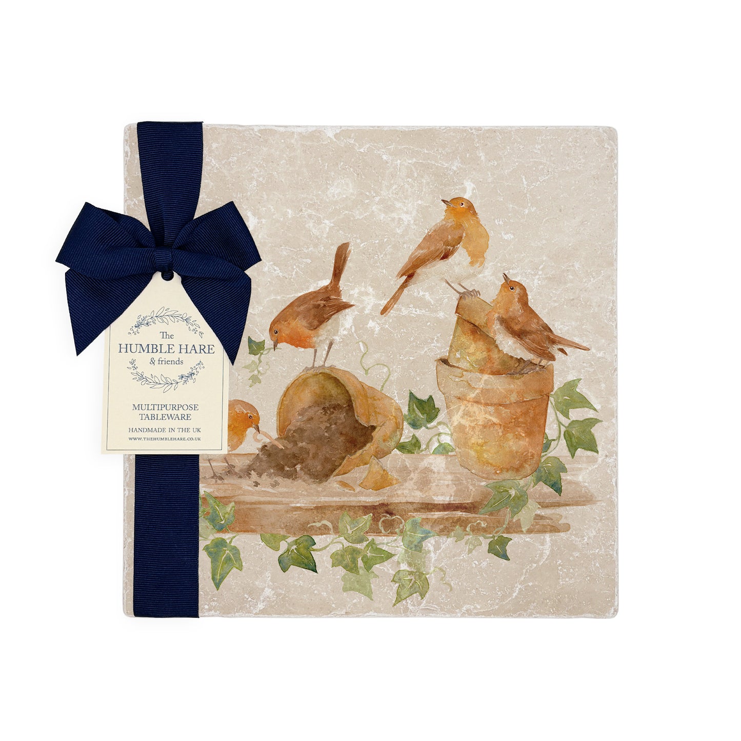 A medium multipurpose marble platter with a watercolour robin design, packaged with a luxurious dark blue bow and branded gift tag.