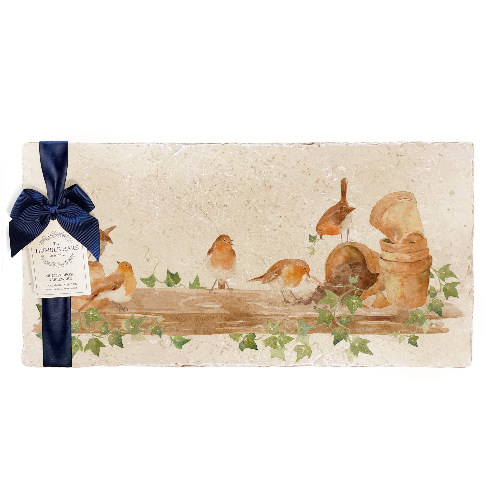 A multipurpose marble sharing platter with a watercolour robin design, packaged with a luxurious dark blue bow and branded gift tag.