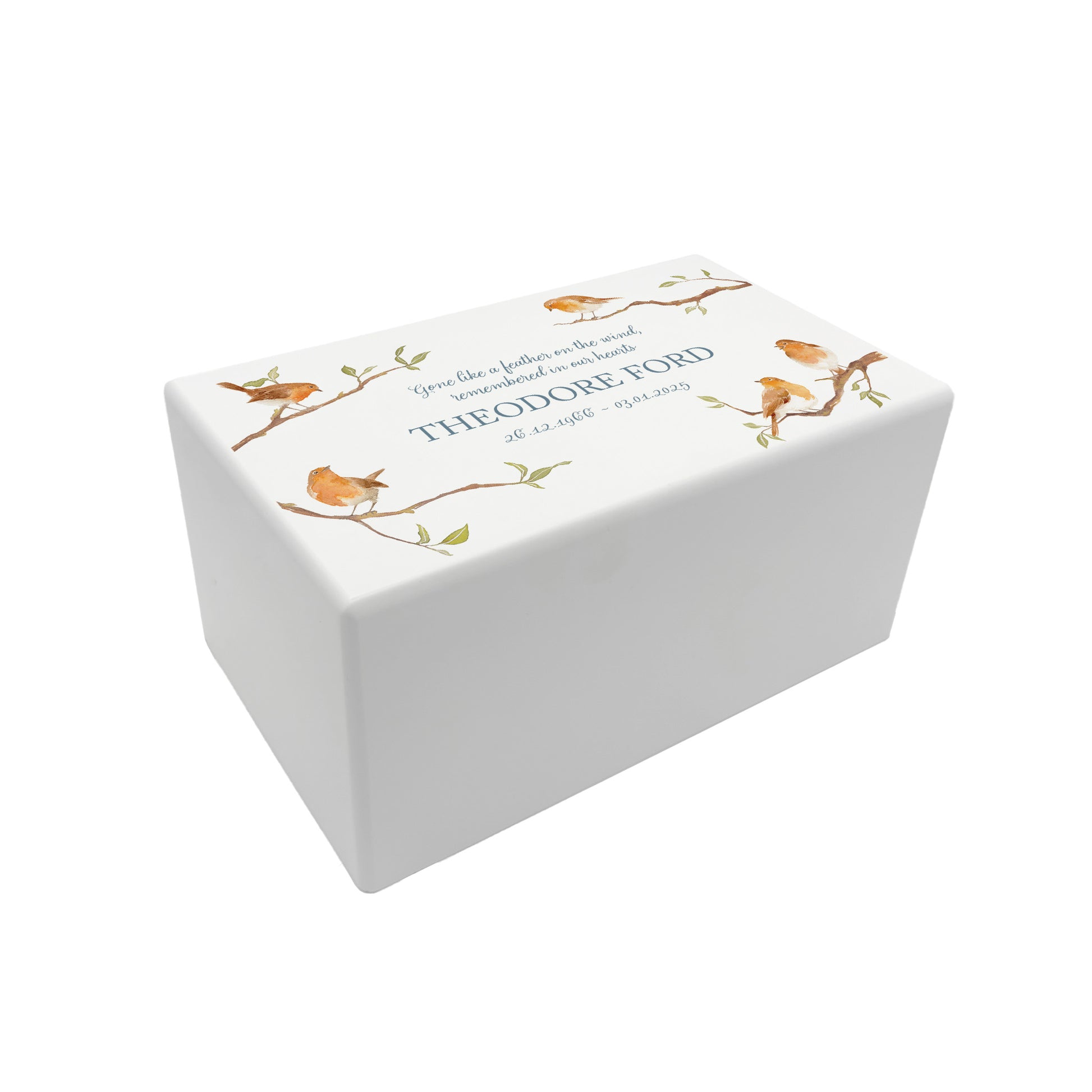 A beautifully crafted solid wooden urn, finished in white with a soft watercolour design of Robins of Branches, Thoughtfully made for either display or burial, this personalised urn can be customised to create a meaningful memorial. Perfect for holding ashes of a loved one or a beloved pet, it serves as a comforting tribute and keepsake.