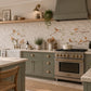 Countryside landscape marble mural creating a statement kitchen feature, Robins on Branches. Watercolour animals on wall tiles. 