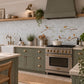 Countryside landscape marble mural creating a statement kitchen feature, Robins on Branches. Watercolour animals on wall tiles. 