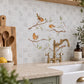 Countryside landscape marble mural creating a statement kitchen feature, Robins on Branches. Watercolour animals on wall tiles. 