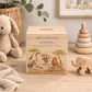 handmade baby money box with watercolour illustration in neutral nursery unique personalised gift with Animals from the savannah all gathered around the watering hole. 