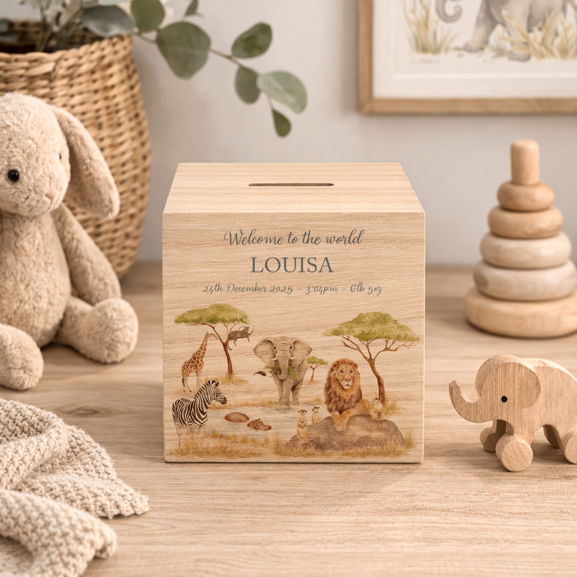 handmade baby money box with watercolour illustration in neutral nursery unique personalised gift with Animals from the savannah all gathered around the watering hole. 