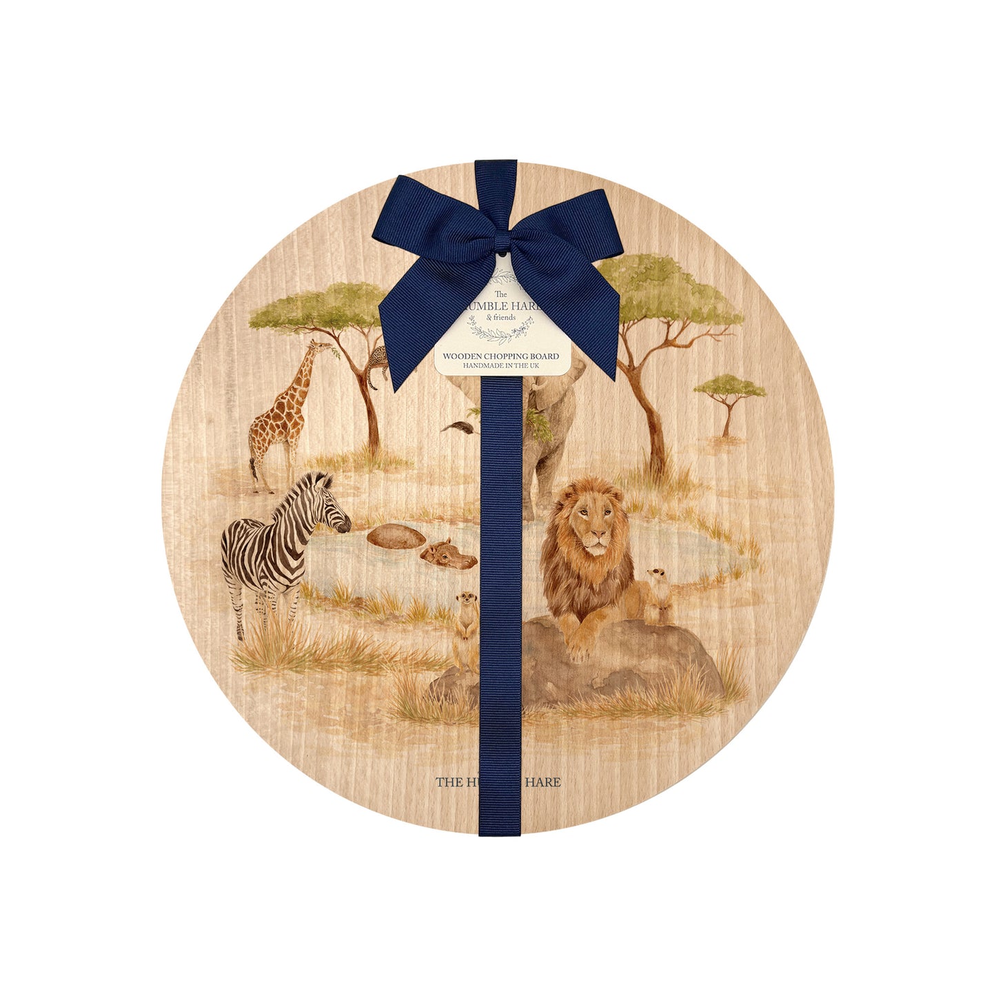 Round beech wood chopping board featuring a watercolour design of safari animals in the African savannah. The wooden board is finished with a blue gift ribbon and tag.