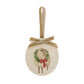 An oval Christmas ornament featuring a sheep wearing a green wreath and red bow, suspended from a gold velvet ribbon loop with a matching ribbon bow at the top, set against a plain white background.