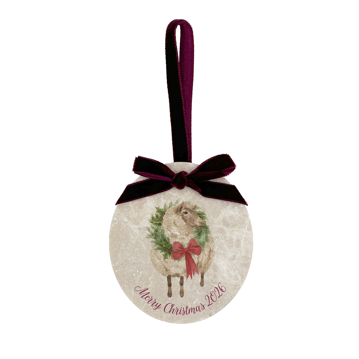 An oval marble Christmas ornament featuring a vintage-style illustration of a sheep in a green wreath with a red bow, hanging from a dark burgundy velvet ribbon. The ornament has personalised text reading 'Merry Christmas 2026' written in burgundy script at the bottom.