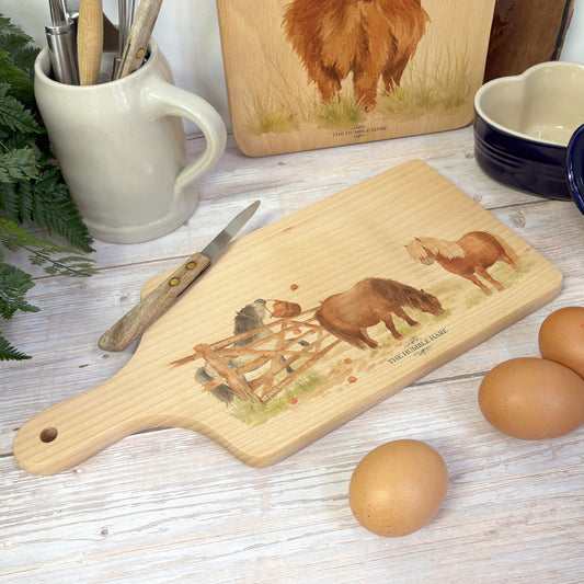 little Shetlands being cheeky and playing on our wooden chopping boards 