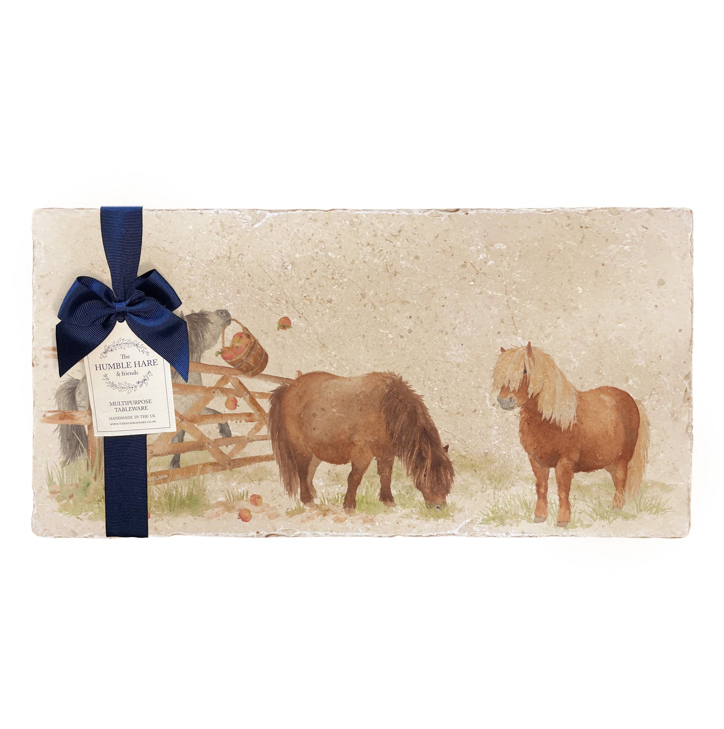 A multipurpose marble sharing platter with a watercolour Shetland pony design, packaged with a luxurious dark blue bow and branded gift tag.
