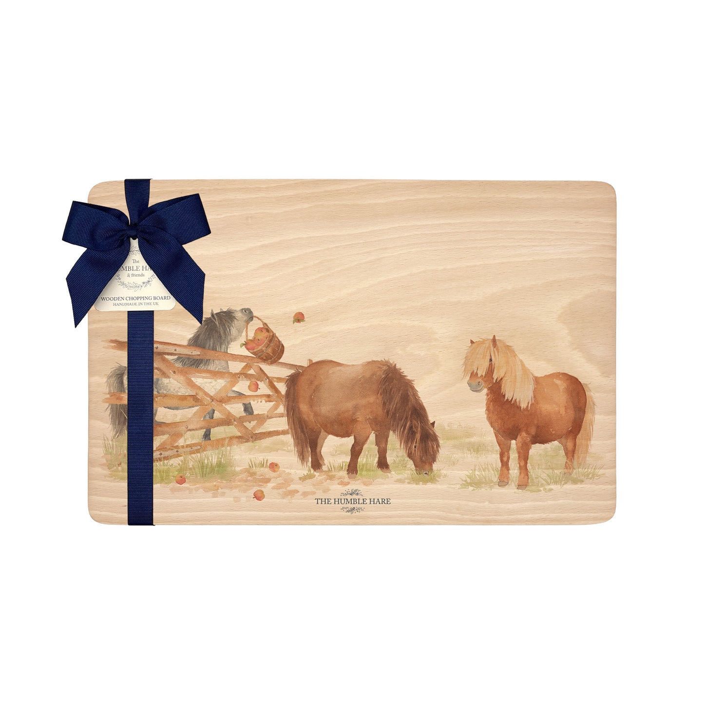 Shetlands playing in the field, featuring on our wooden chopping boards 
