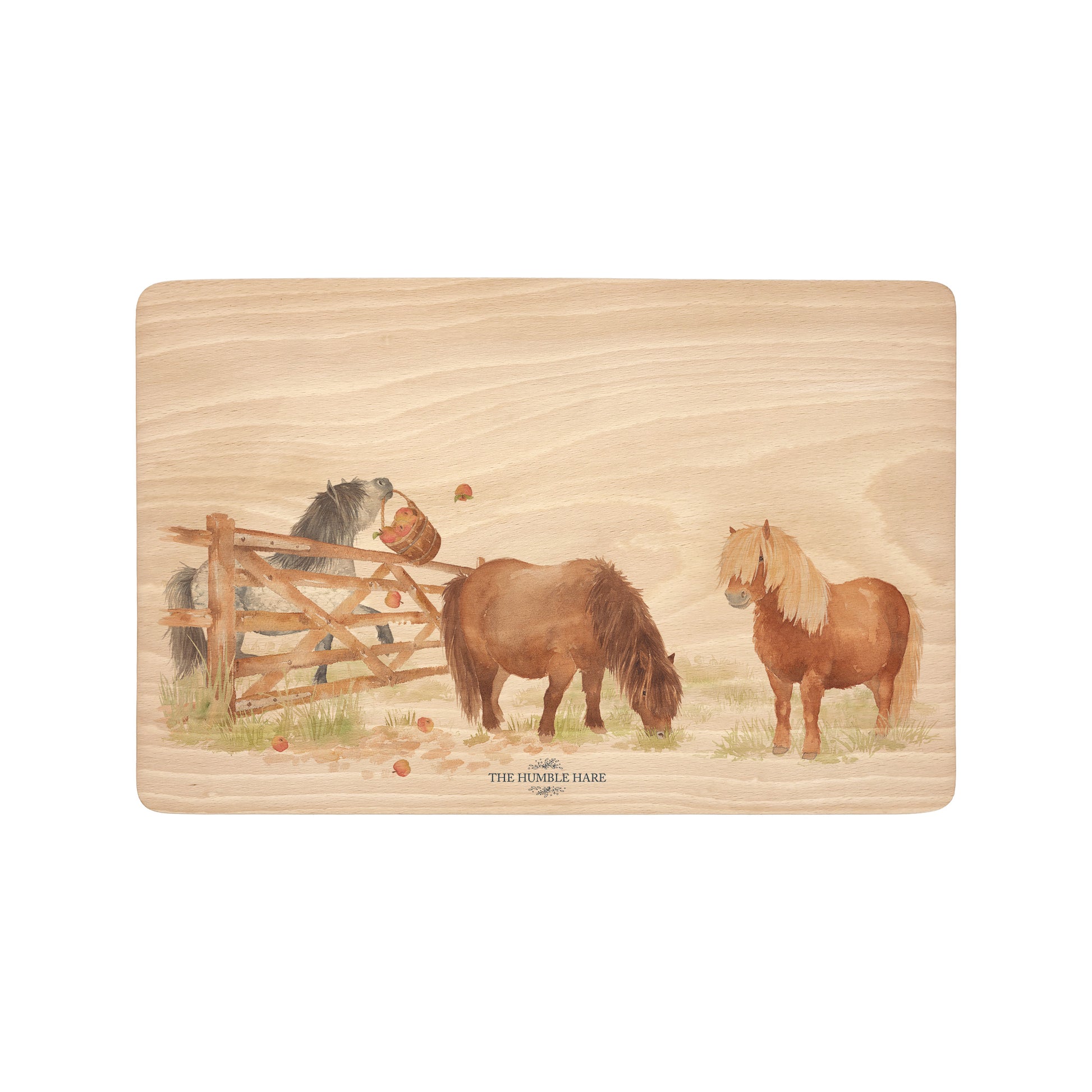Shetlands playing in the field, featuring on our wooden chopping boards 