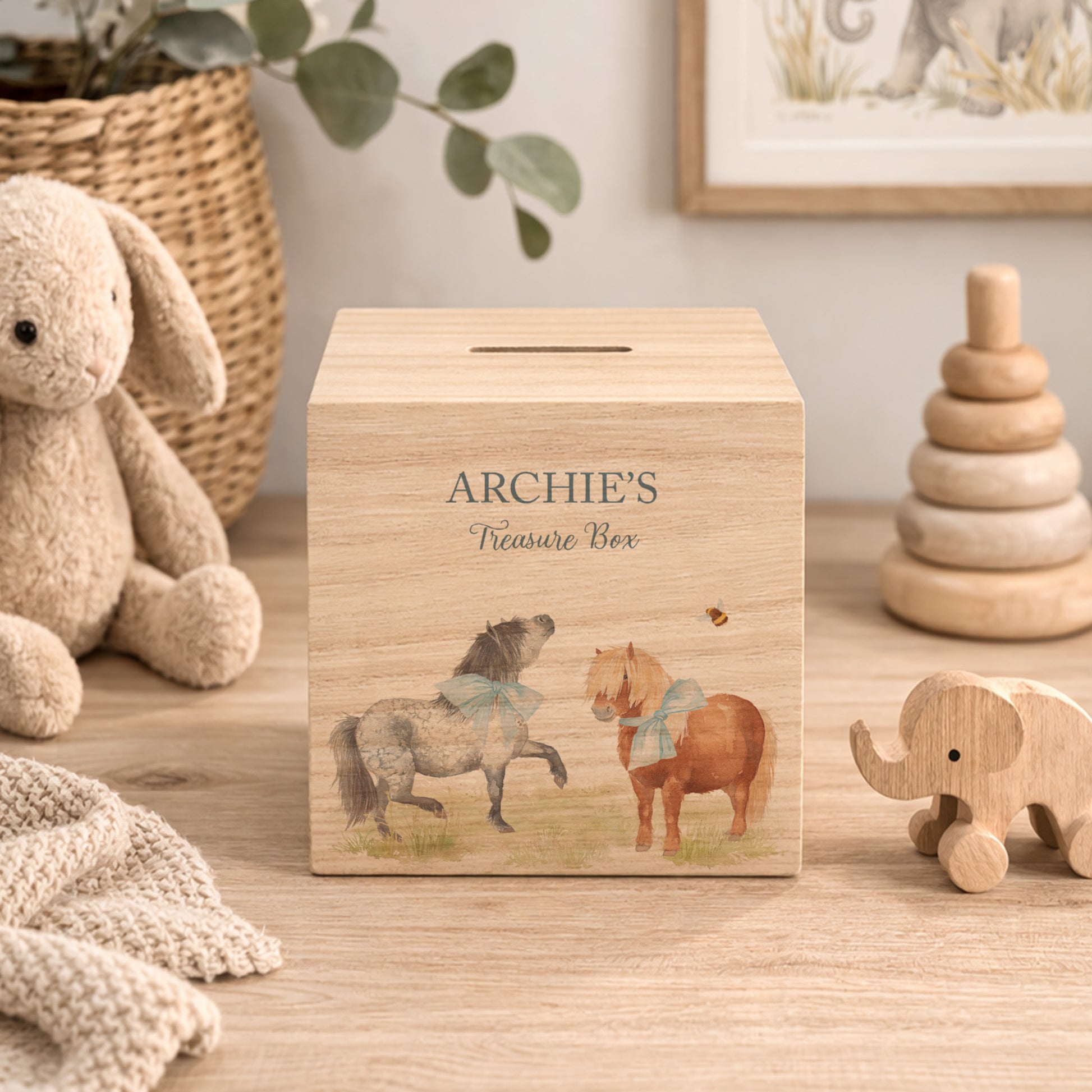 personalised handmade wooden money box for christening nursery decor, Shetland ponies playing with bunting and bows around their neck. 