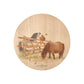 Round beech wood chopping board featuring a watercolour design of cheeky Shetland ponies.