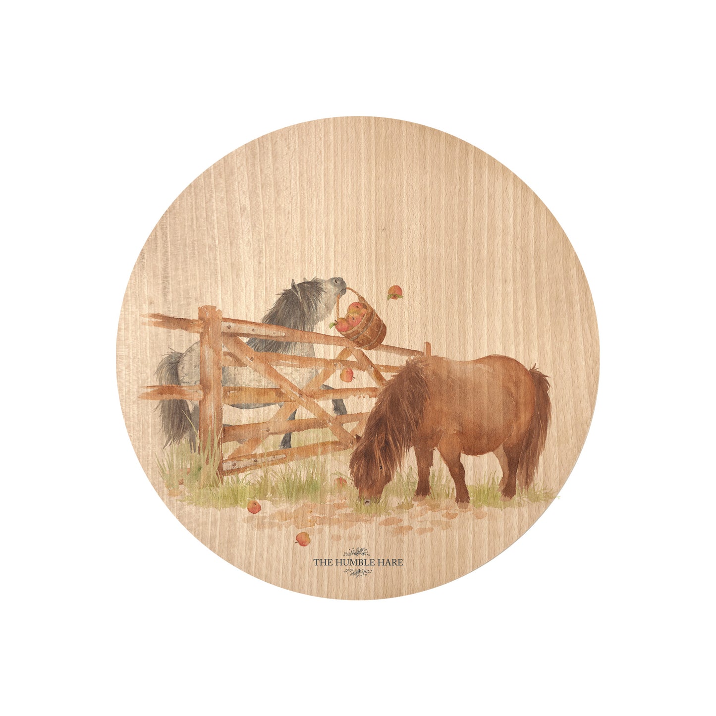 Round beech wood chopping board featuring a watercolour design of cheeky Shetland ponies.